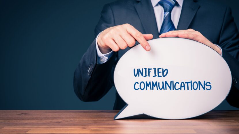 man pointing at text unified communications